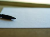 image of a pen on paper