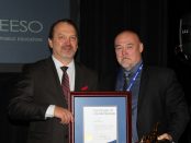 Photo of Harvey Bischof, President-elect presenting outgoing President Paul Elliott with OSSTF/FEESO Life Member Award