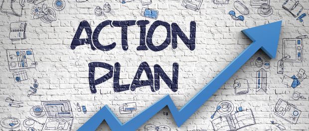 Graphic of a simulated brick wall with the words Action Plan spray painted on it