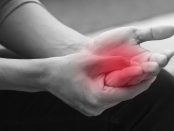 man suffering from trigger finger, arthritis, wrist pain